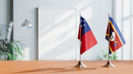 FLAGS OF SAMOA AND SWAZILAND ON TABLE