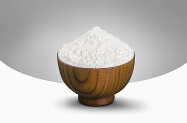 Wheat Flour in Bowl on light background