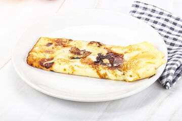 Sweet pancake with banana and honey