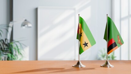 FLAGS OF SAO TOME AND ZAMBIA ON TABLE