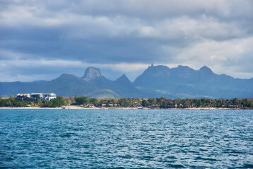 Amazing seascape view of Mauritius island shore and mountains