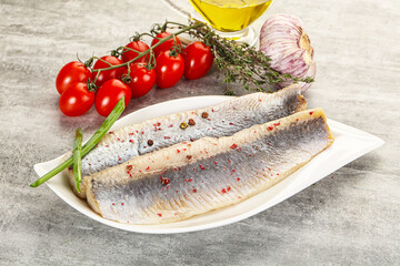 Marinated herring fillet with green onion