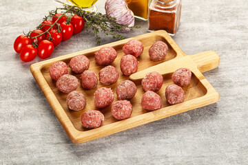 Uncooked raw beef meatball minced