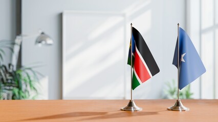 FLAGS OF SOMALIA AND SOUTH SUDAN ON TABLE
