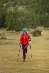 A woman in a red jacket