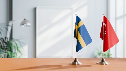 FLAGS OF SWEDEN AND TURKEY ON TABLE