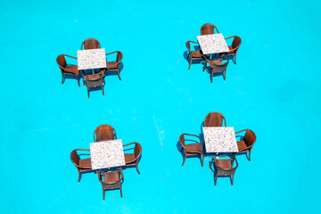 aerial of tables at a boat deck in pop art style