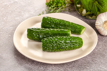 Homemade lighty salted cucumbers with herbs