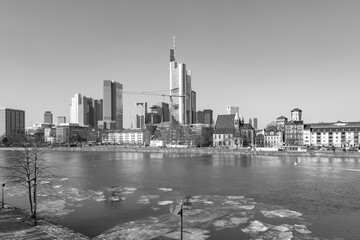 Fototapeta premium City of Frankfurt, Germany with river main and floating ice