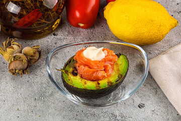 Whole grilled avocado with salmon