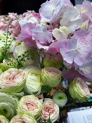 pink flowers and white roses in bouquet