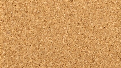 High-resolution close-up texture of a grainy, light brown, compacted material