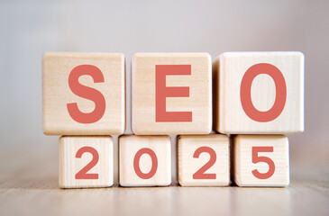 Seo 2025 concept. Wooden cubes on a wooden table.