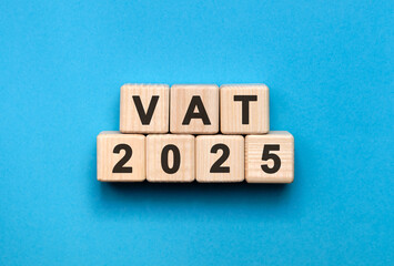 Numbers 2025 and text Vat on cubes on a blue background