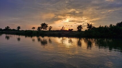 sunset sky over the river