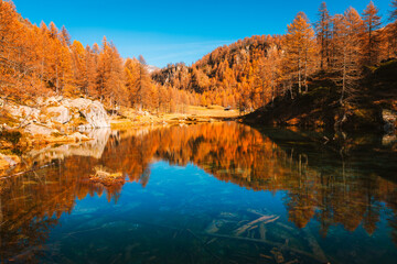 Golden Reflections on Lake of Witches, Piedmont, Italy