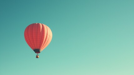 Fototapeta premium soaring hot air balloon in a clear blue sky, representing freedom, elevation, and achieving goals in a limitless horizon
