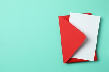 Paper card with red envelope. Empty greeting card for text design