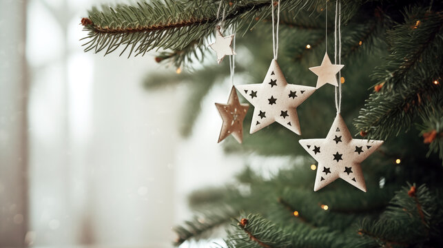 Christmas star ornaments in Christmas tree. Christmas decor. Decorated Christmas tree. Christmas tree branches