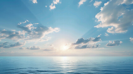 A serene beach landscape with a clear sky at sunrise, capturing the beauty of a tranquil horizon in the early morning light. This nature scene features a beautiful blue ocean and soft white clouds.