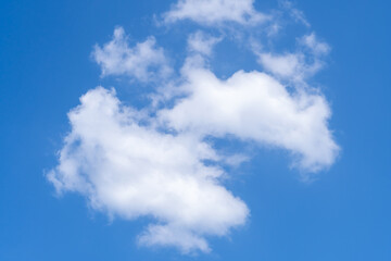 Low angle view and full frame of beautiful blue sky with strange shape of clouds in the morning or evening in sunny day used as natural background texture in decorative art work
