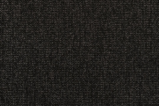 abstract background of grey knit upholstery fabric texture close up