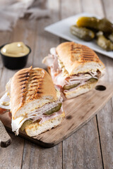 Traditional Cuban sandwich on wooden table