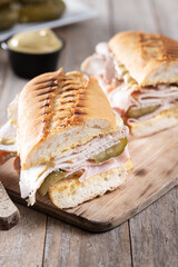 Traditional Cuban sandwich on wooden table