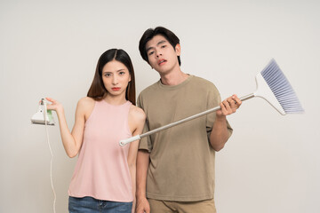 Upset People quarreling unhappy asian couple attractive in various action gesture holding iron and...