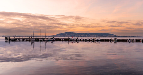 Sunrise, on the Thau lagoon, in Balaruc-les-Bains, on the Thau lagoon, and Sète in the background.