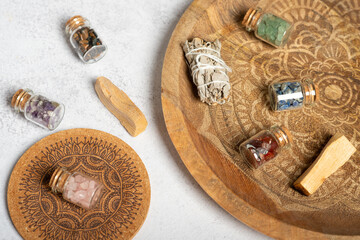 Beautiful gemstones and druses of natural purple mineral amethyst on a pink background. Amethysts and rose quartz. Large crystals of semi-precious stones.