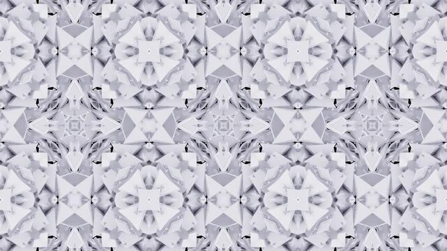 3d animation of white and grey triangle flower shapes