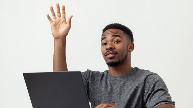 Student engagement and learning concept in a classroom setting - young learner raising hand