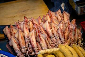 a plate of fresh squid is neatly arranged
