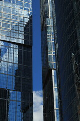 Fototapeta premium Glass facade of skyscrapers located in the business center of Moscow.