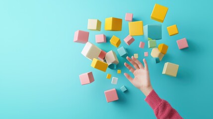 A colorful array of building blocks appears to float above a hand reaching out, set against a bright turquoise background.