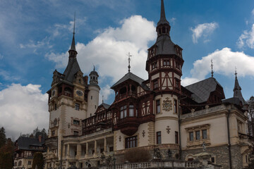 Fototapeta premium Romania Sinaia Peles Castle on a cloudy summer day