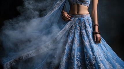 Female model in traditional bridal lehenga, with intricate details under studio lighting