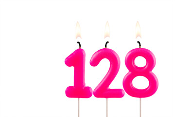 Pink number 128 birthday candle on white background