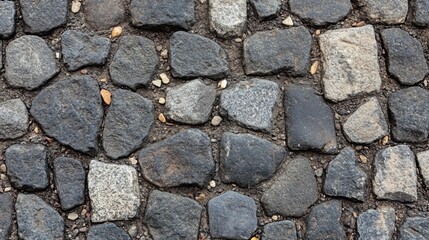Fototapeta premium Irregular Stone Pavement Grey And White Cobblestones
