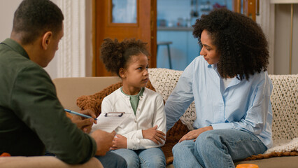 African American mother daughter together visit psychologist social worker bad relationship...