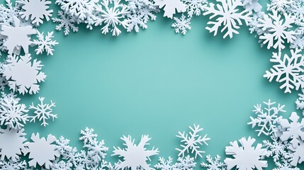 Snowflakes crafted from white paper form a delicate 3D pattern on a soft mint green background, creating a festive frame that captures the essence of winter holiday design.