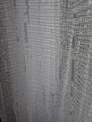 Obraz premium white decorative curtain in a home window
