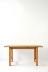 Simple wooden table stands alone against a plain white background of an exposed brick wall._00003_