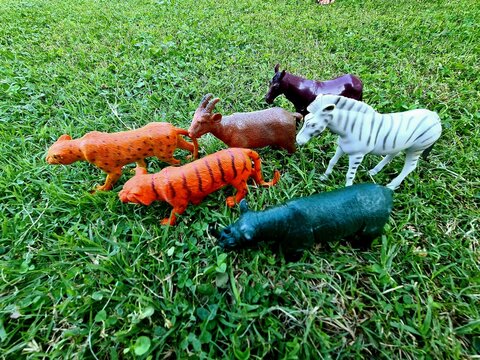 Animal toys isolated over background.