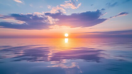 Obraz premium Serene Sunset Over Calm Ocean Waters with Colorful Skies and Soft Clouds Reflecting on Tranquil Surface Against a Peaceful Horizon at Dusk