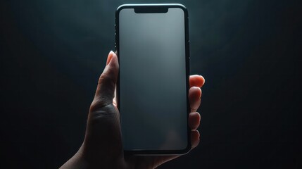 Image of a hand using a mobile phone