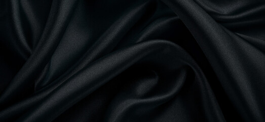 Black fabric background with a cross-sectional texture.