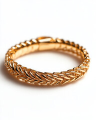 Obraz premium Elegant gold braided bracelet, perfect for fashion enthusiasts.