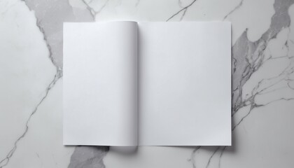 Top view of blank paper on marble with subtle blurred highlights